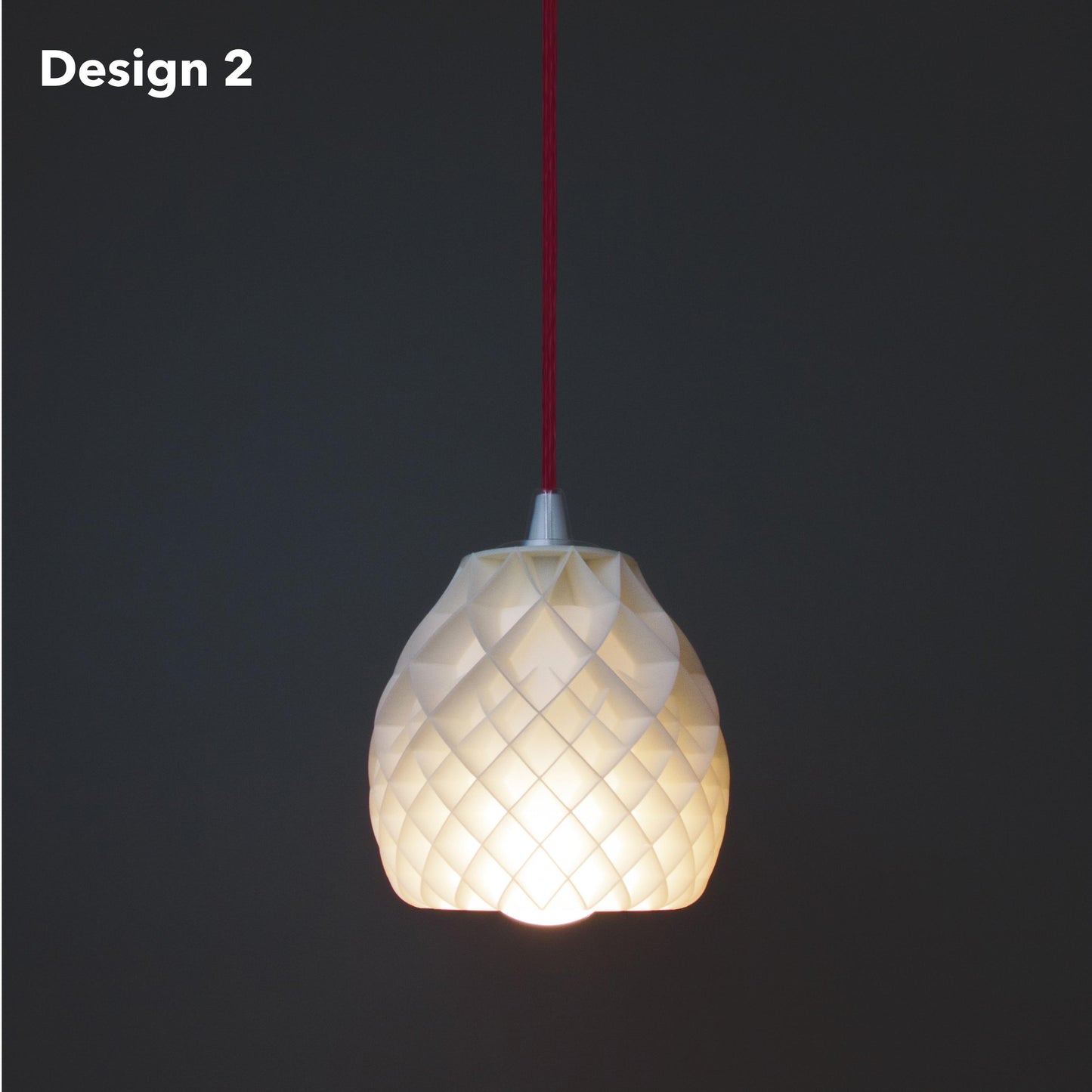 a white light hanging from a red cord