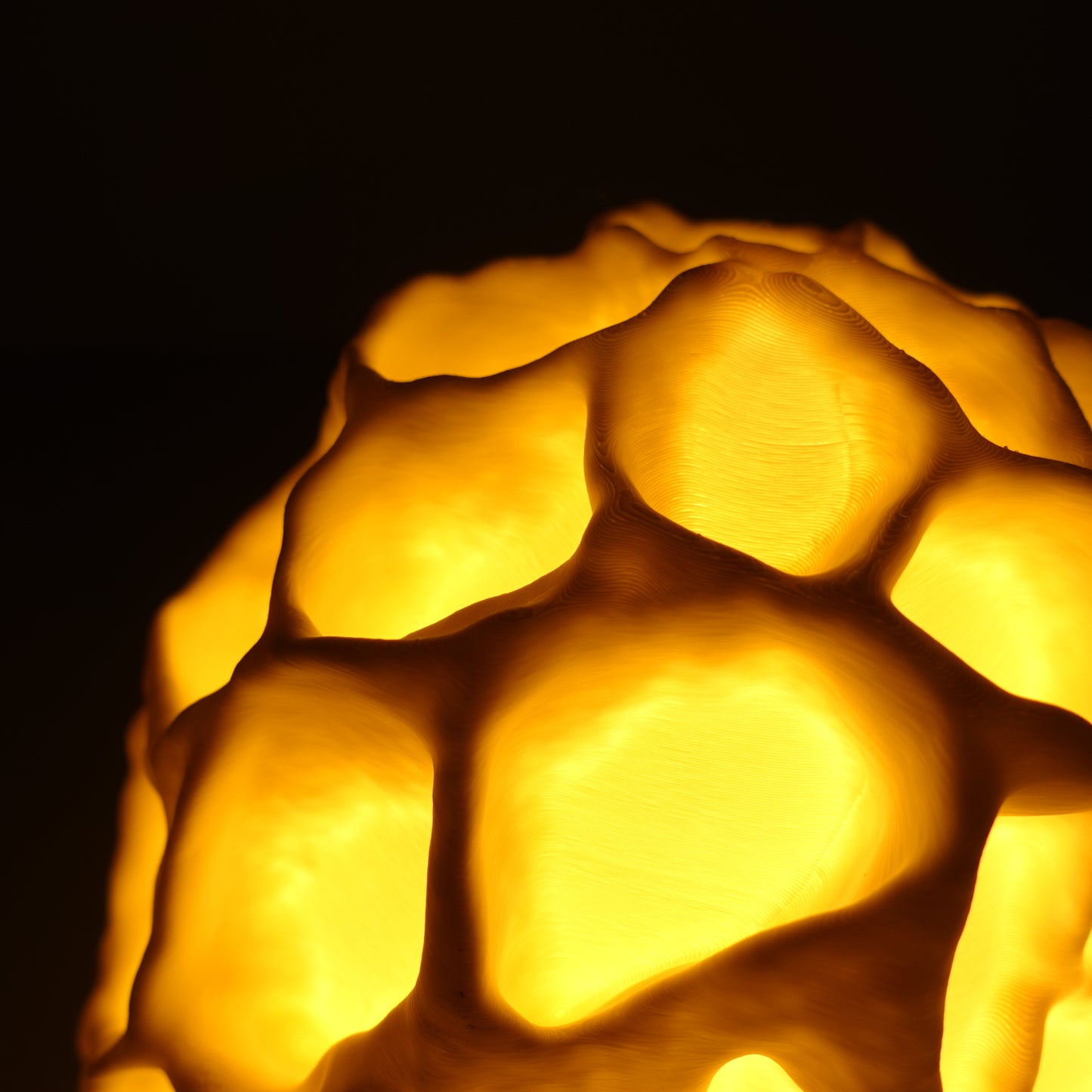 a close up of a light that looks like a honeycomb