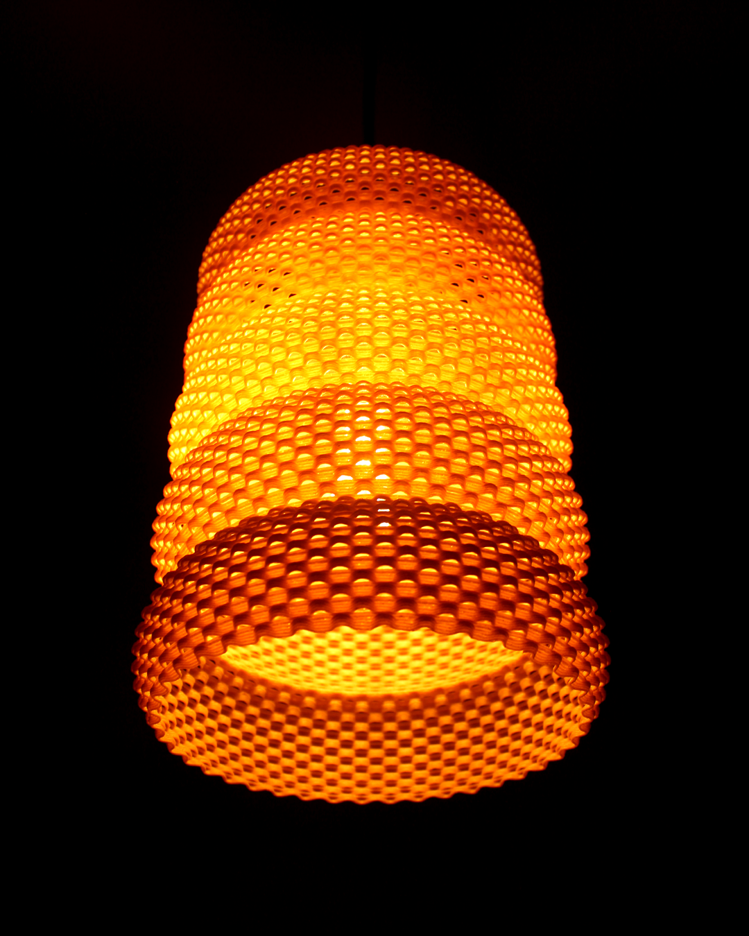 a close up of a traffic light in the dark