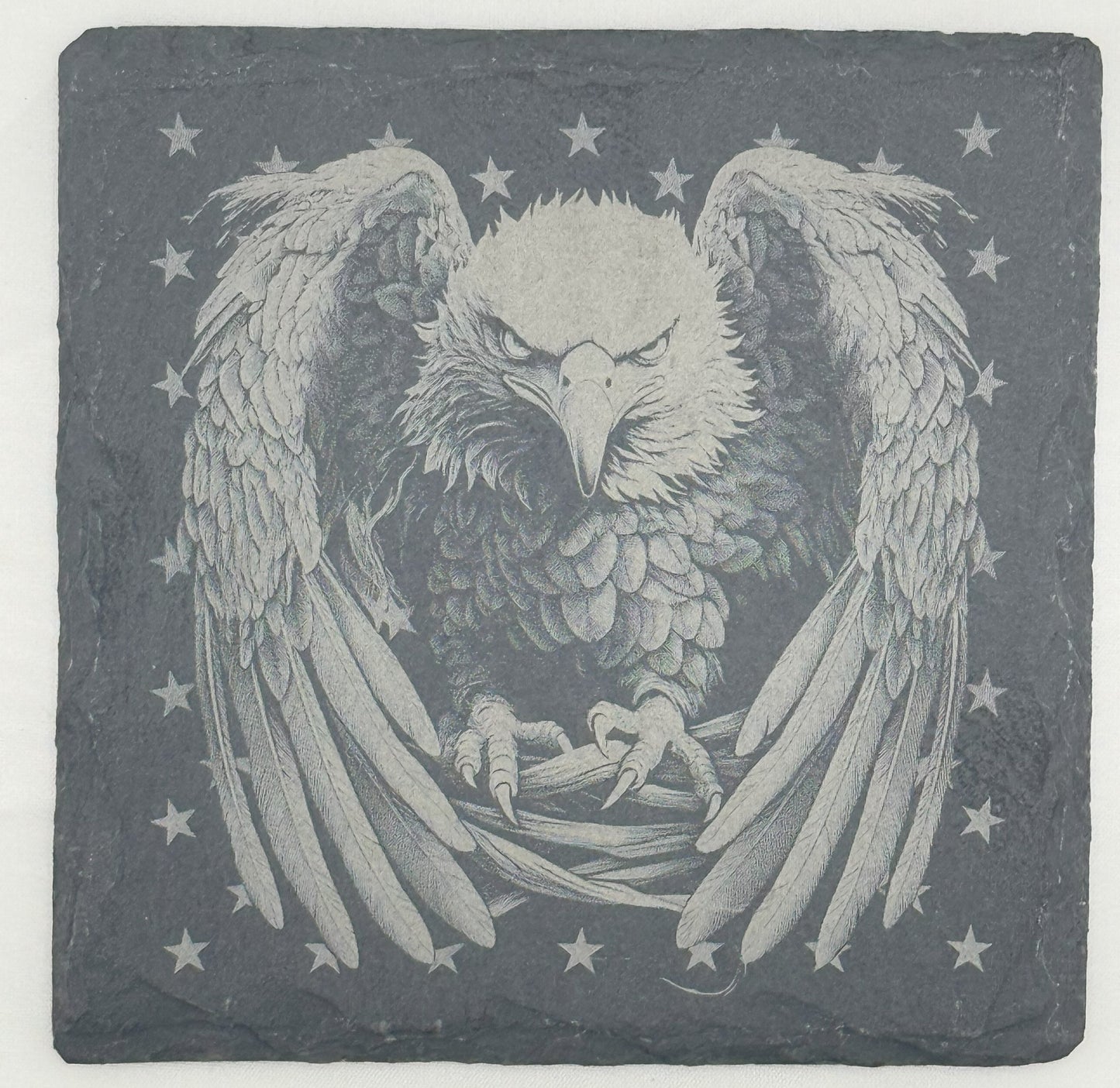 a drawing of an eagle holding a baby