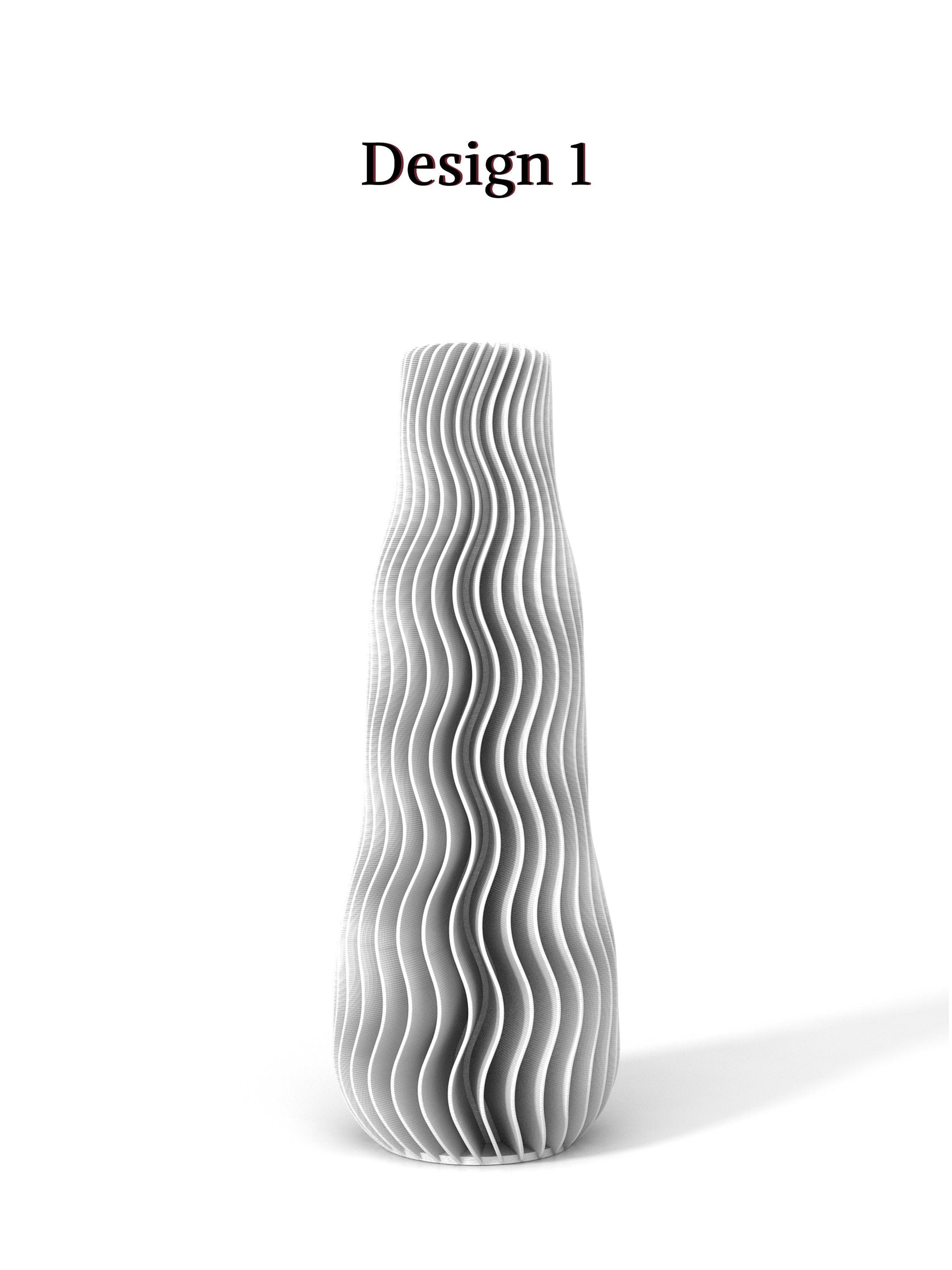 a white vase sitting on top of a white table