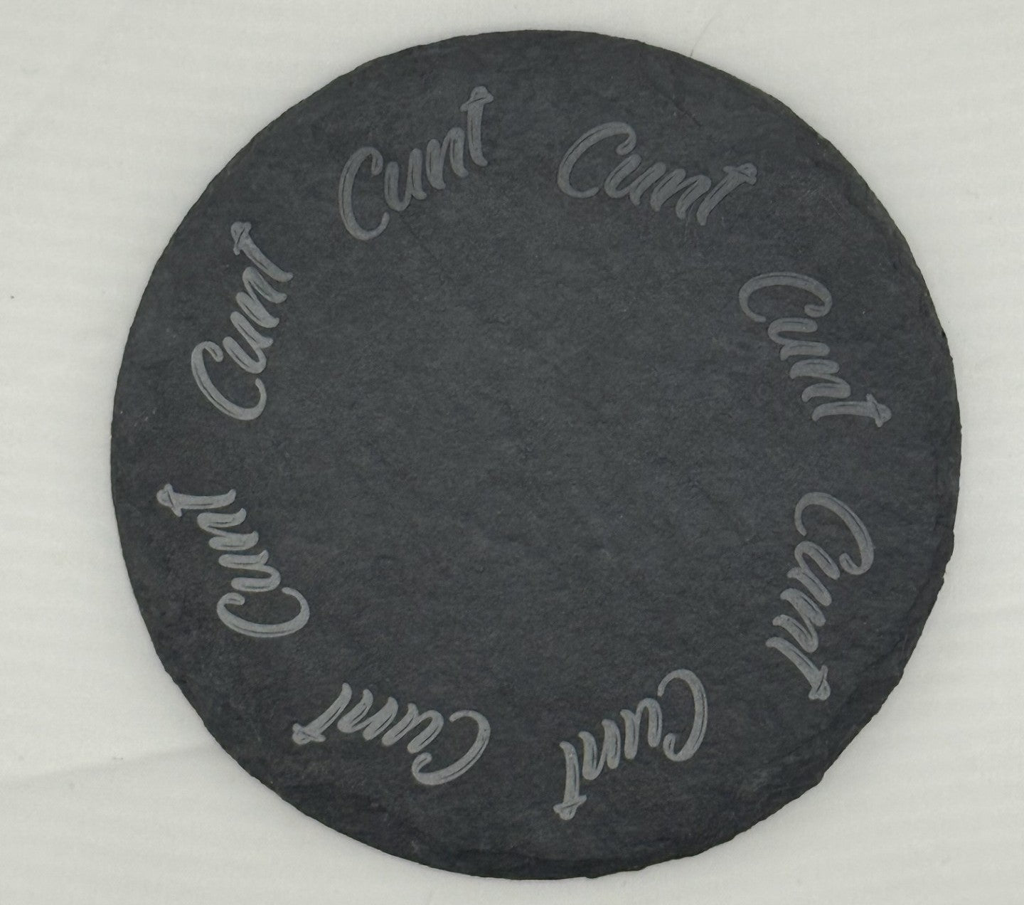 a black stone with writing on it