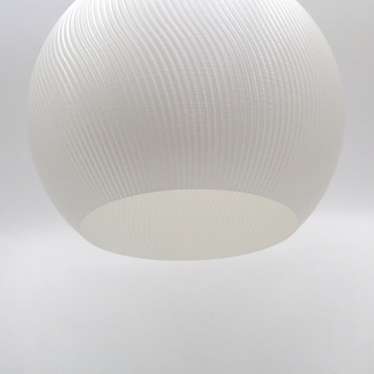 a white light hanging from a ceiling in a room