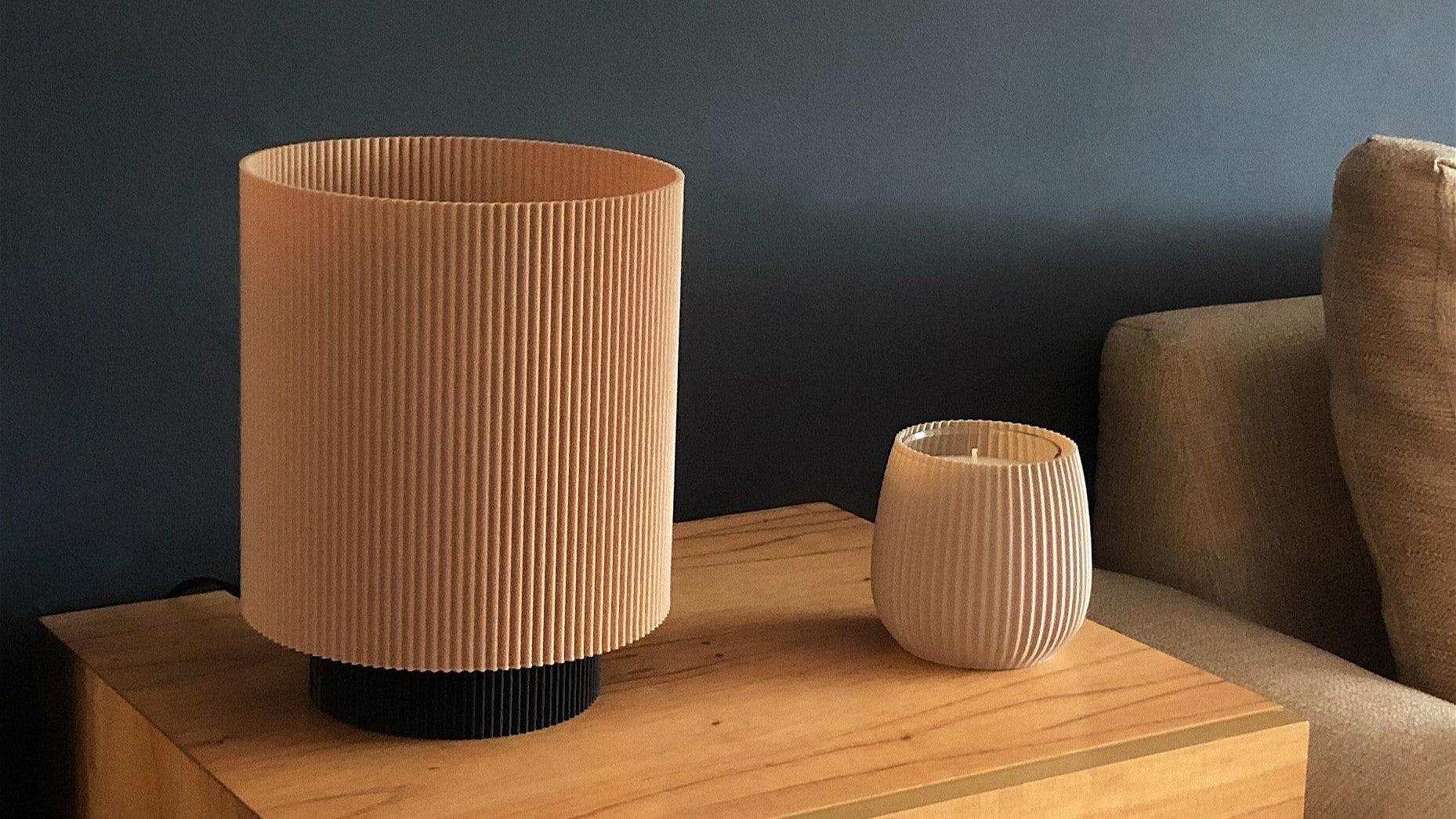 a couple of vases sitting on top of a wooden table