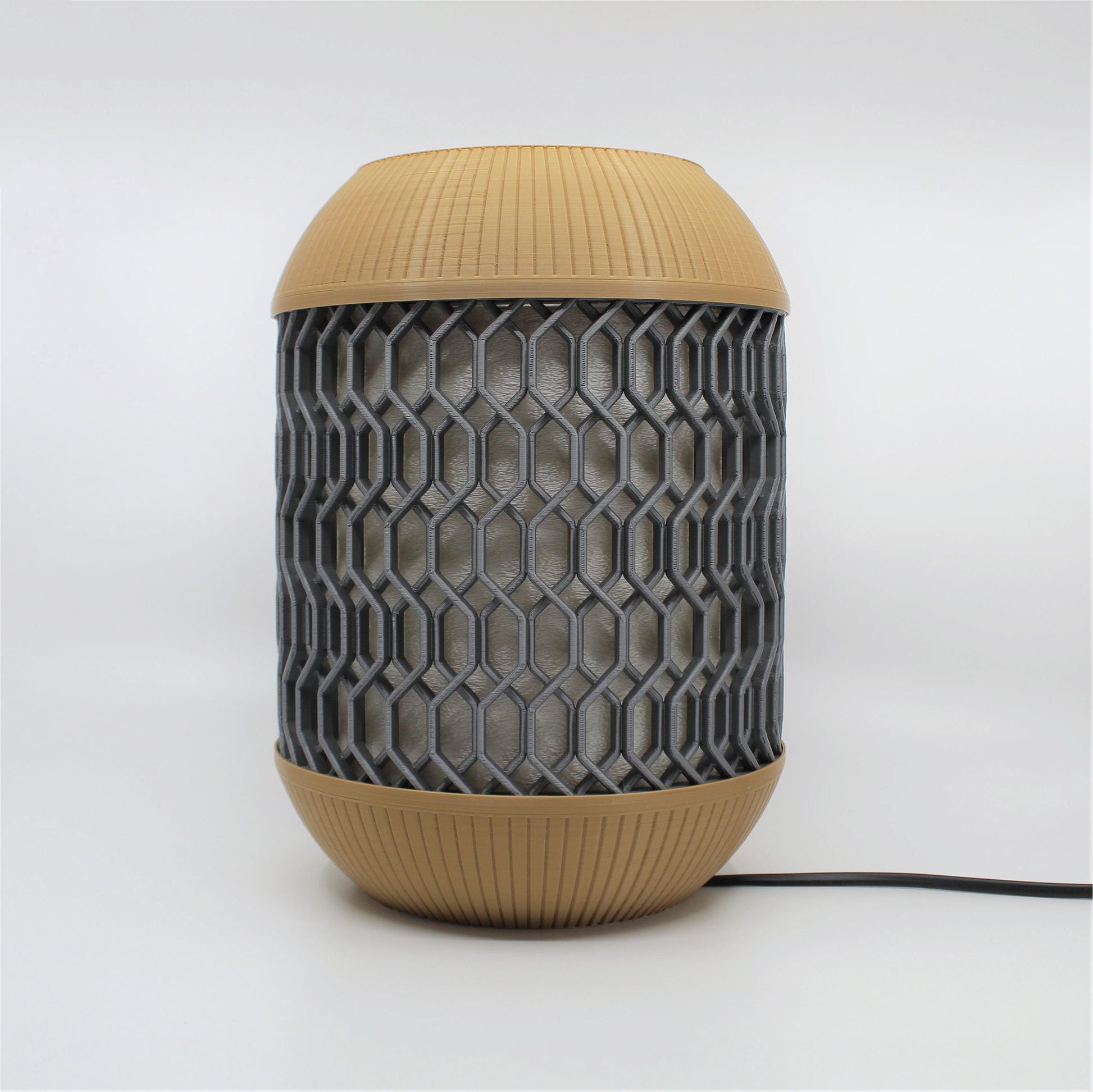 a brown and black speaker sitting on top of a table