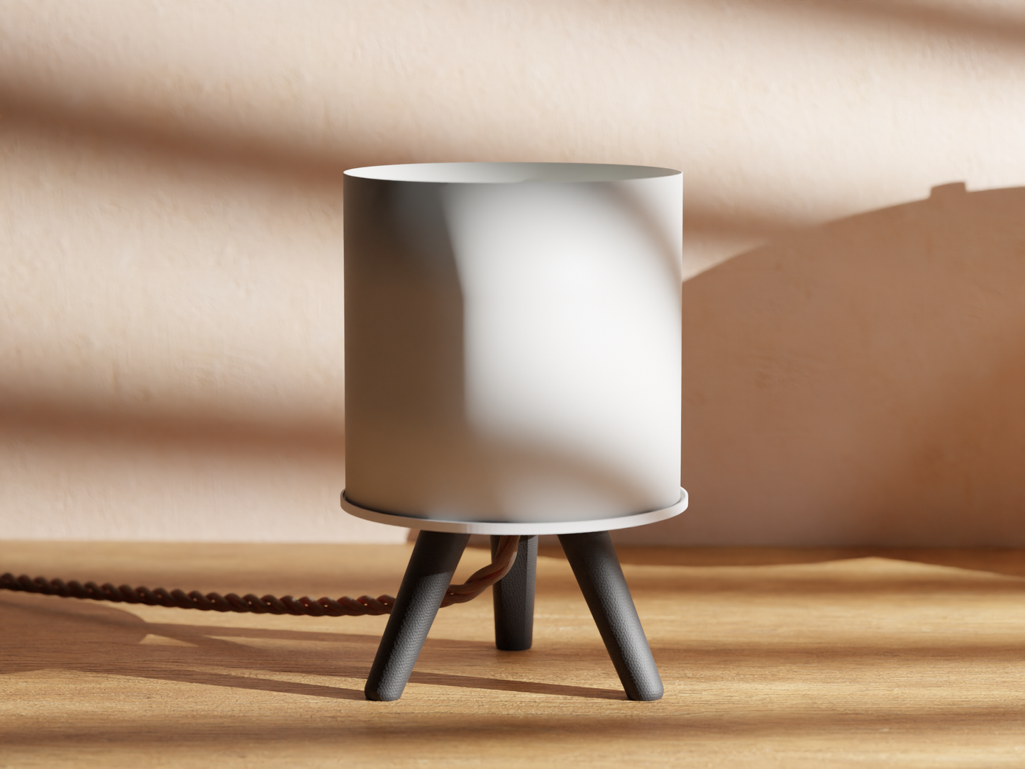 a white lamp sitting on top of a wooden table
