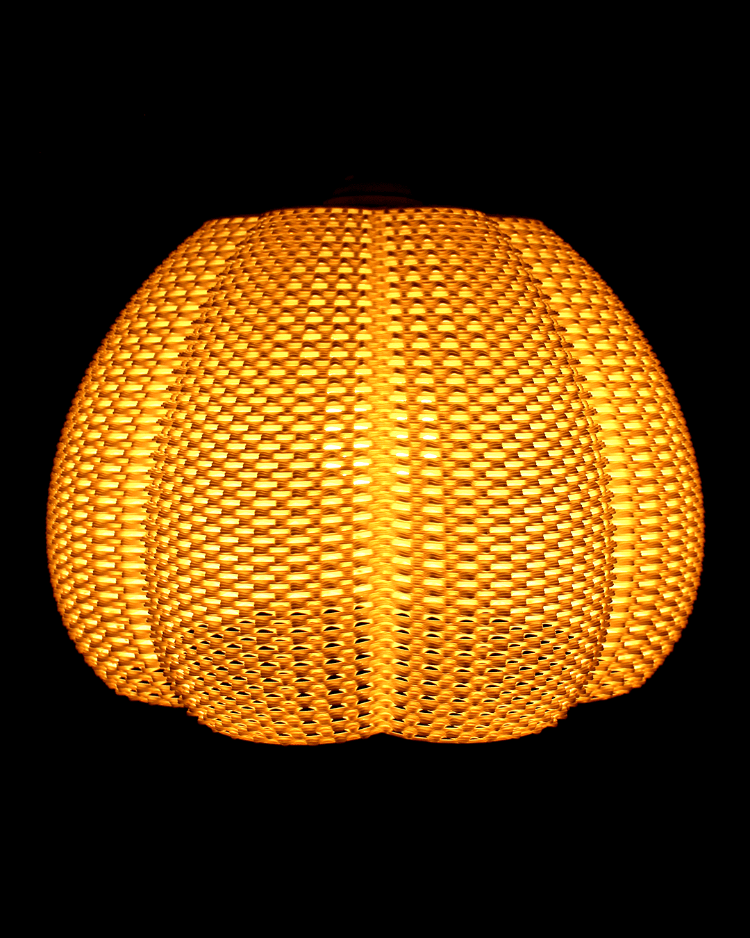 a close up of a yellow light on a black background