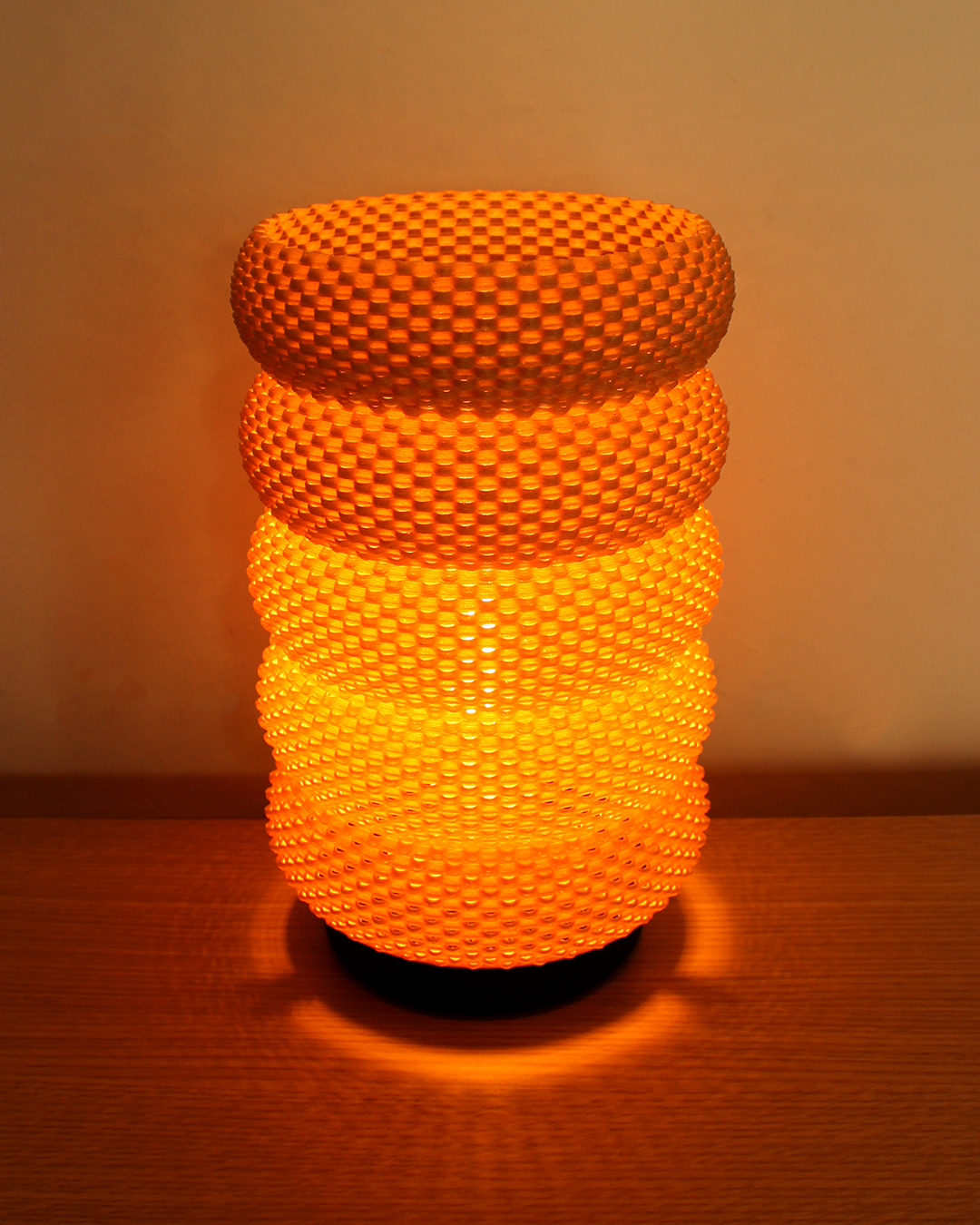 a close up of a lamp on a table