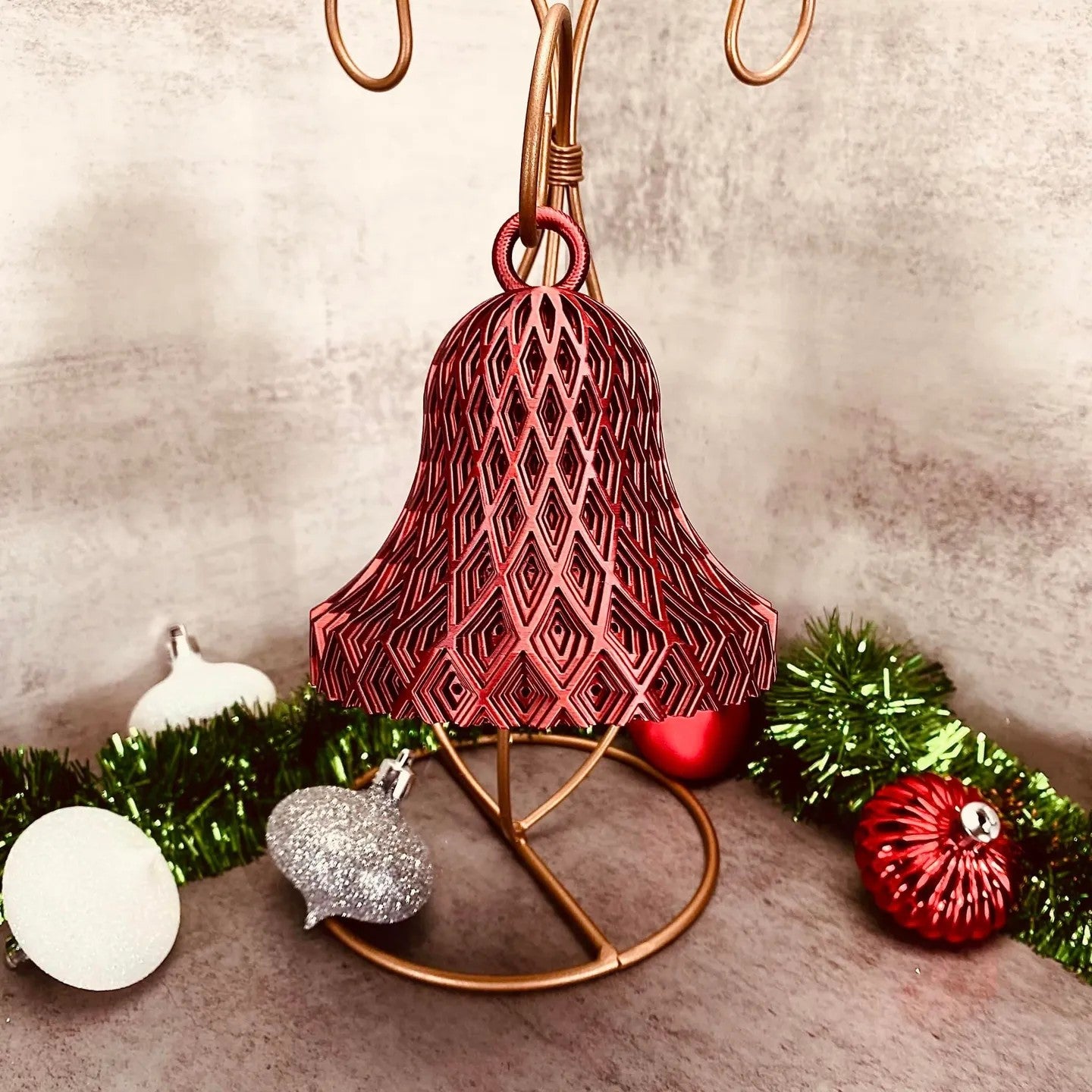 a christmas tree ornament with ornaments around it