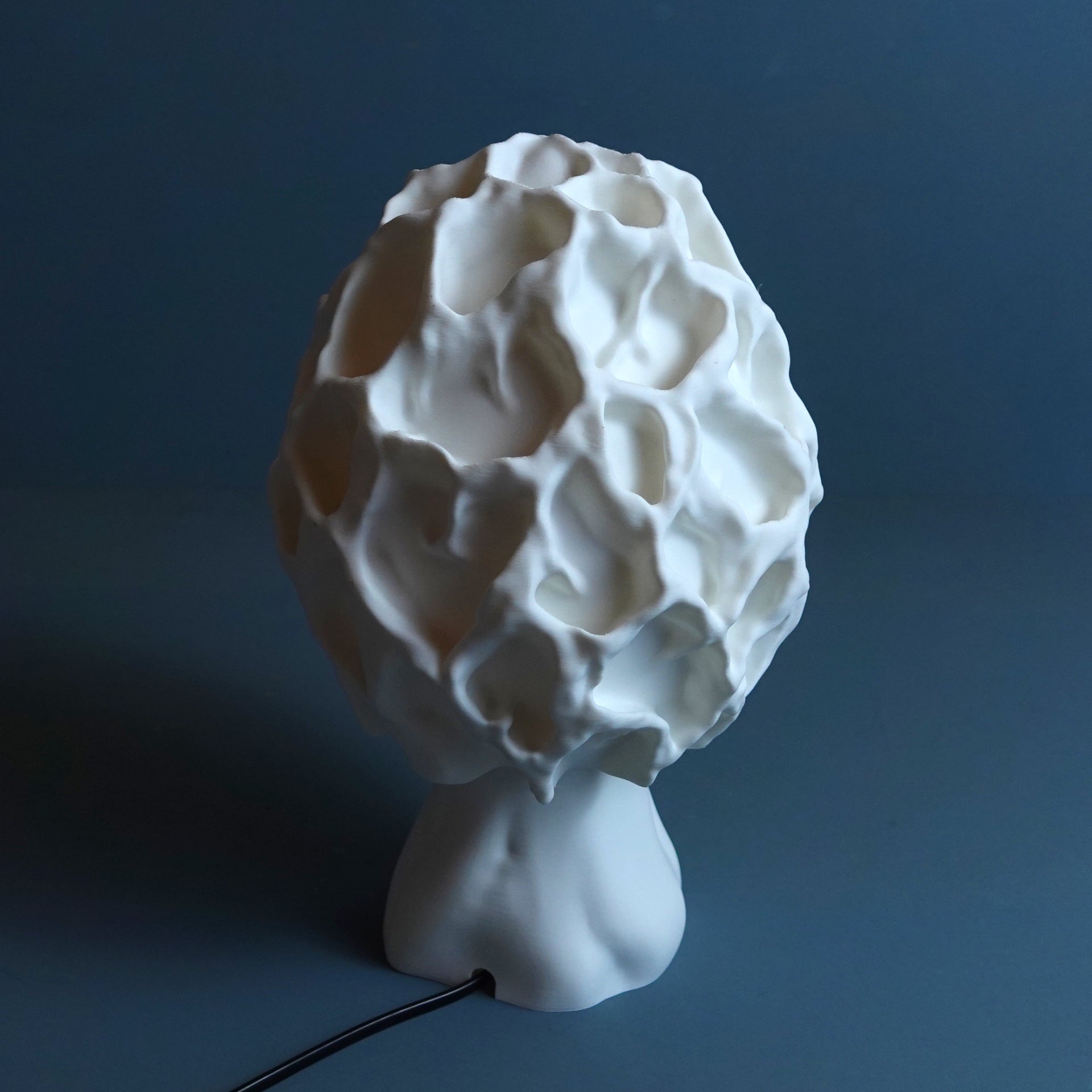 a sculpture of a ball of whipped cream