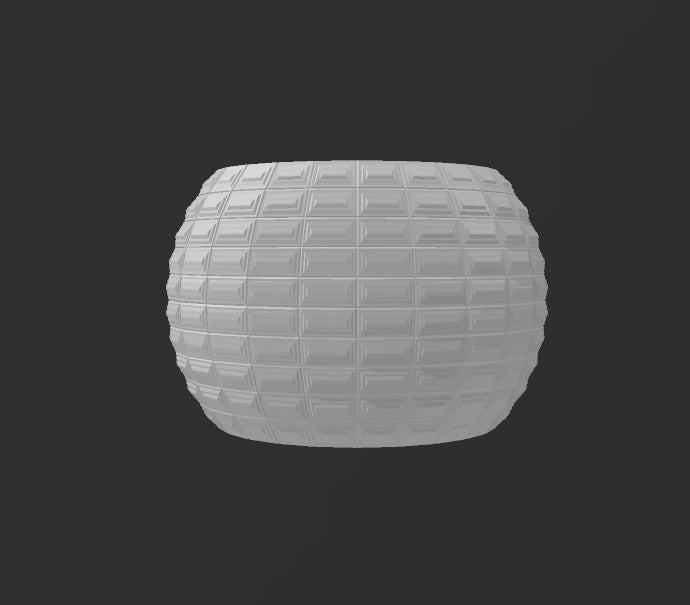 a white vase sitting on top of a black table