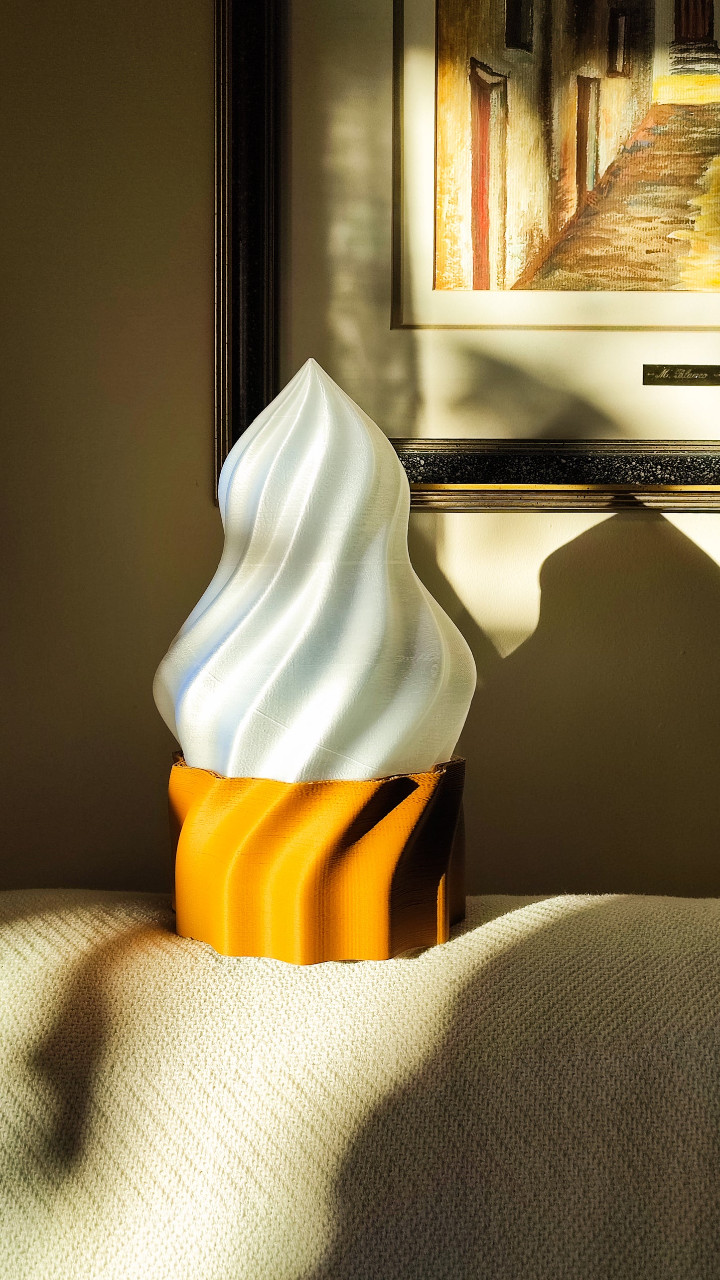 a lamp that is sitting on a bed
