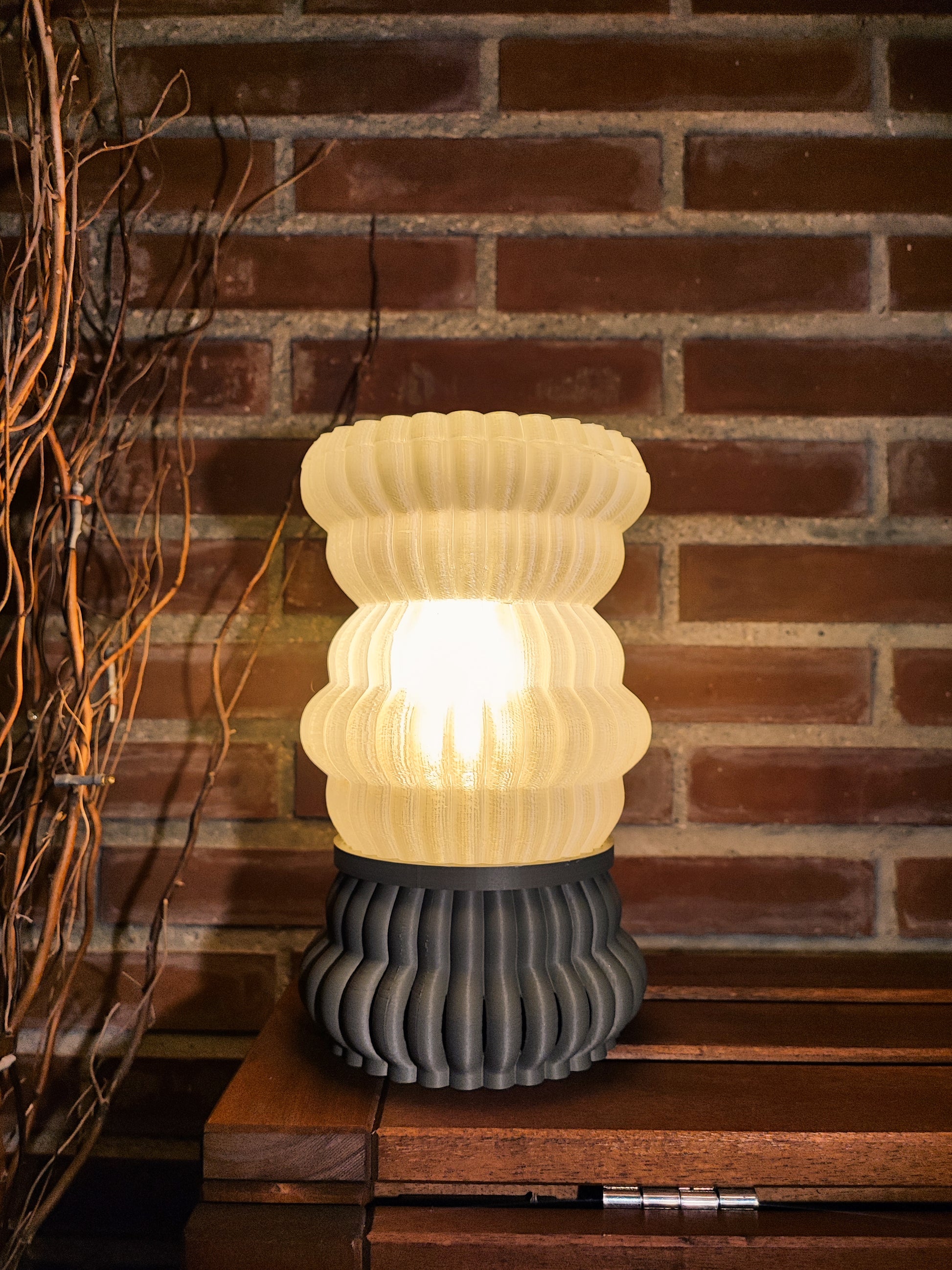 a lamp sitting on top of a wooden table