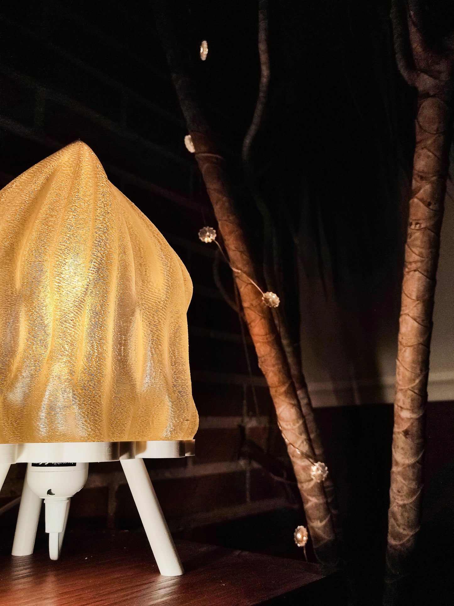 a yellow umbrella sitting on top of a wooden table