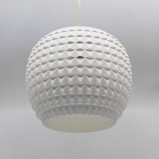 a white light fixture hanging from a ceiling