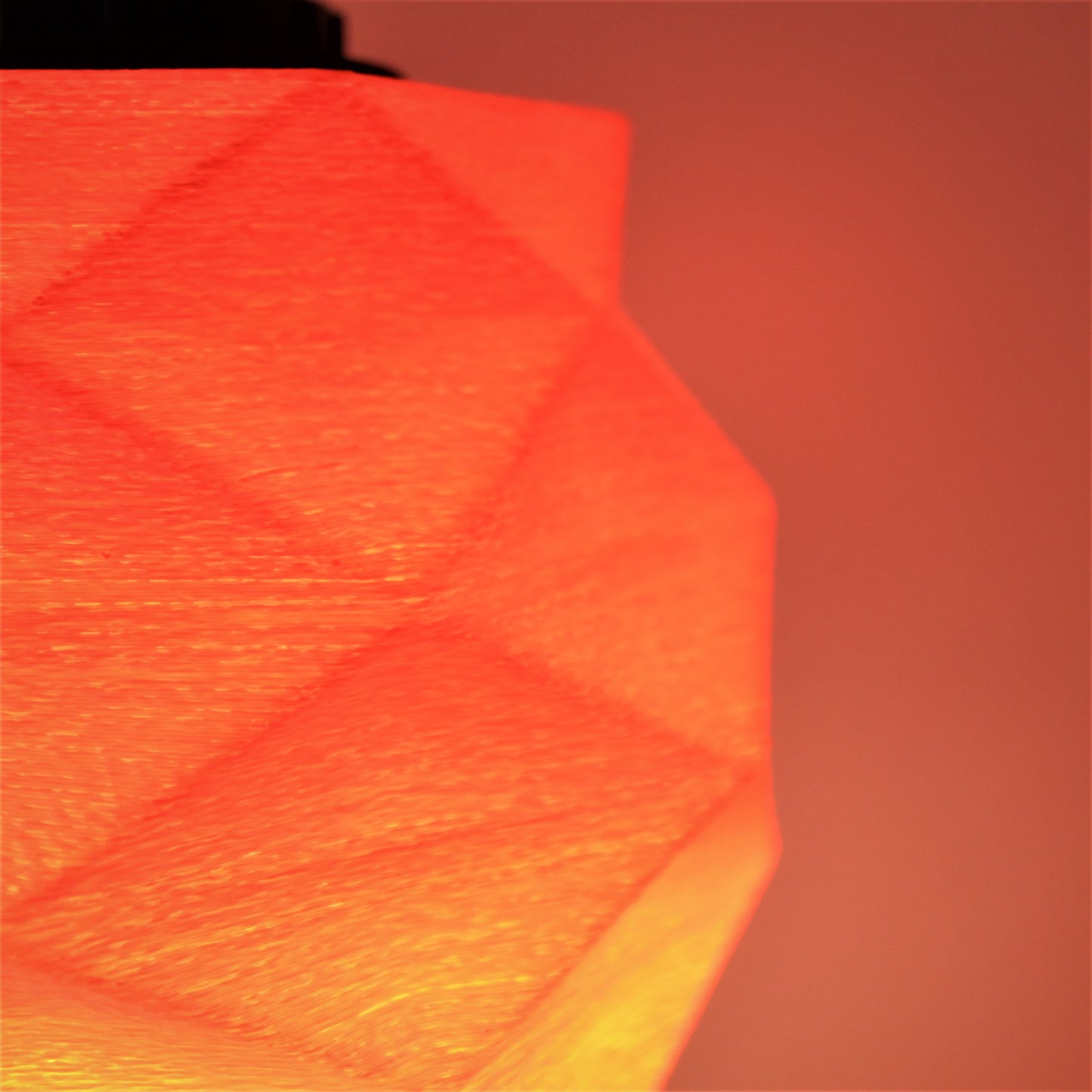 a close up of a lamp with a blurry background