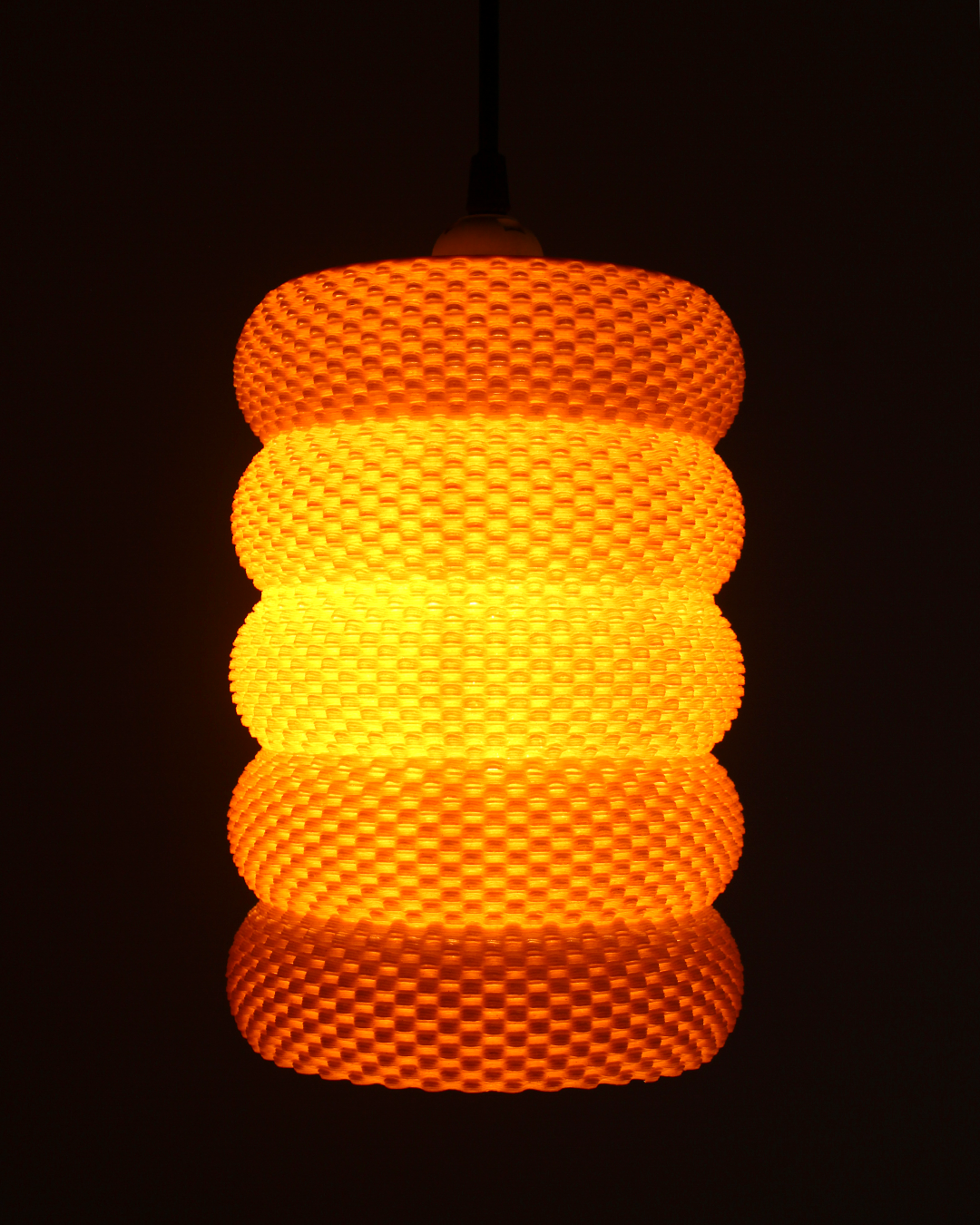 a close up of a traffic light in the dark