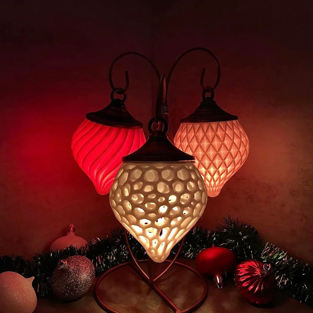 a couple of lamps sitting on top of a table