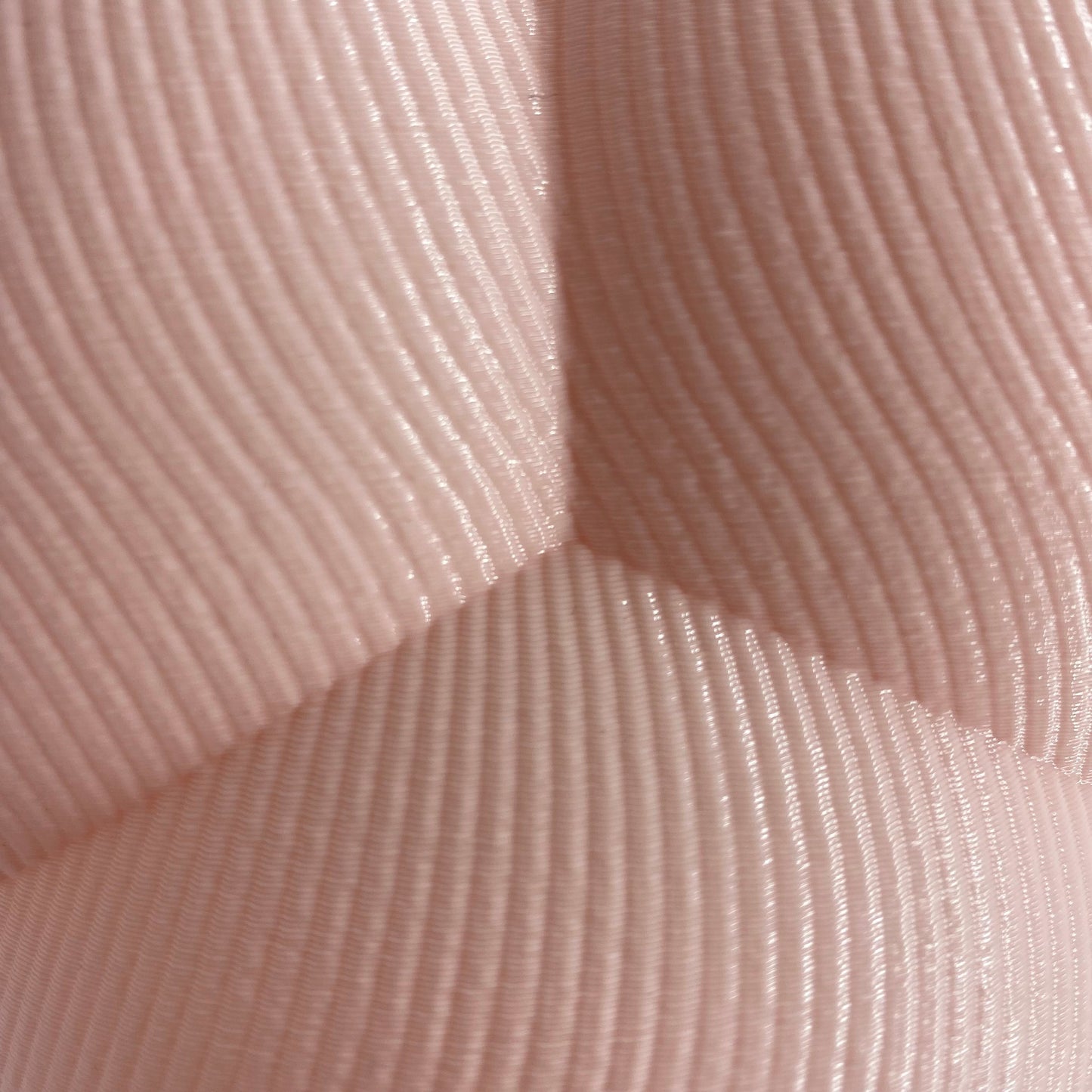 a close up view of a pink fabric