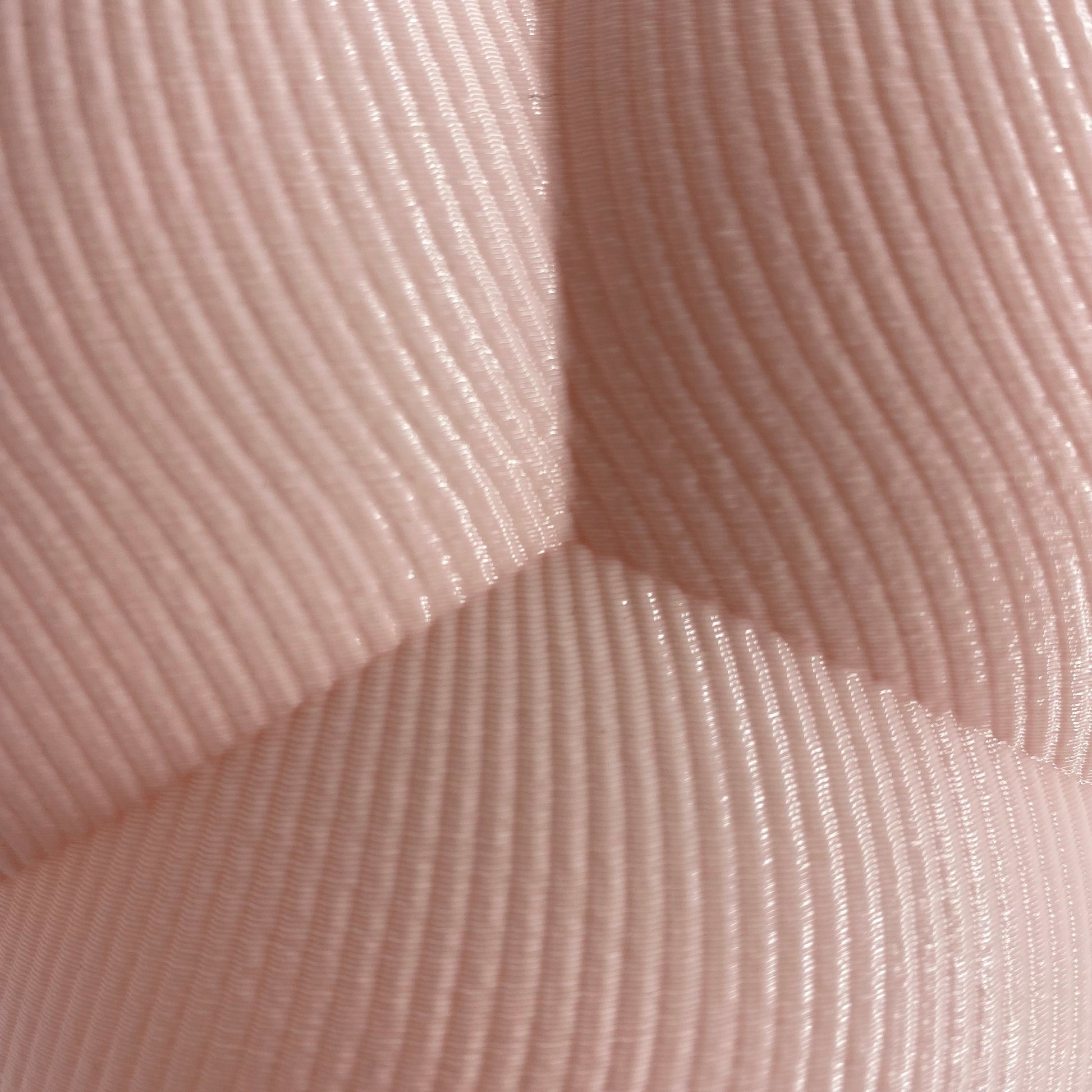 a close up view of a pink fabric