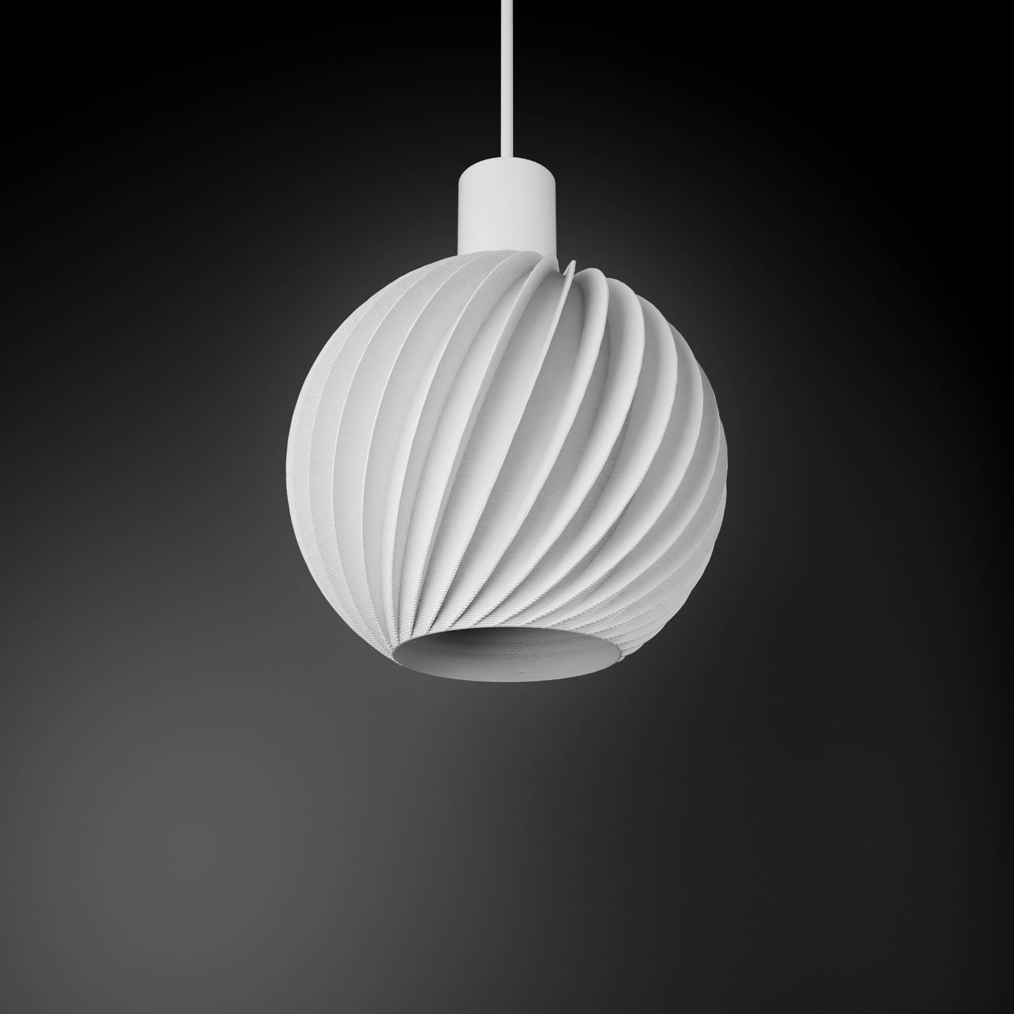 a white light hanging from a ceiling fixture