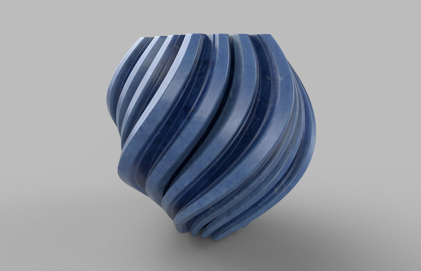 a blue vase sitting on top of a table