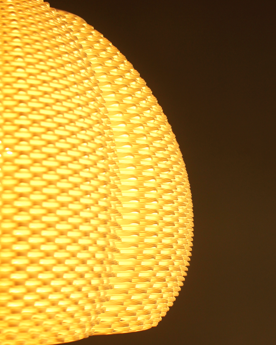 a close up of a yellow light fixture