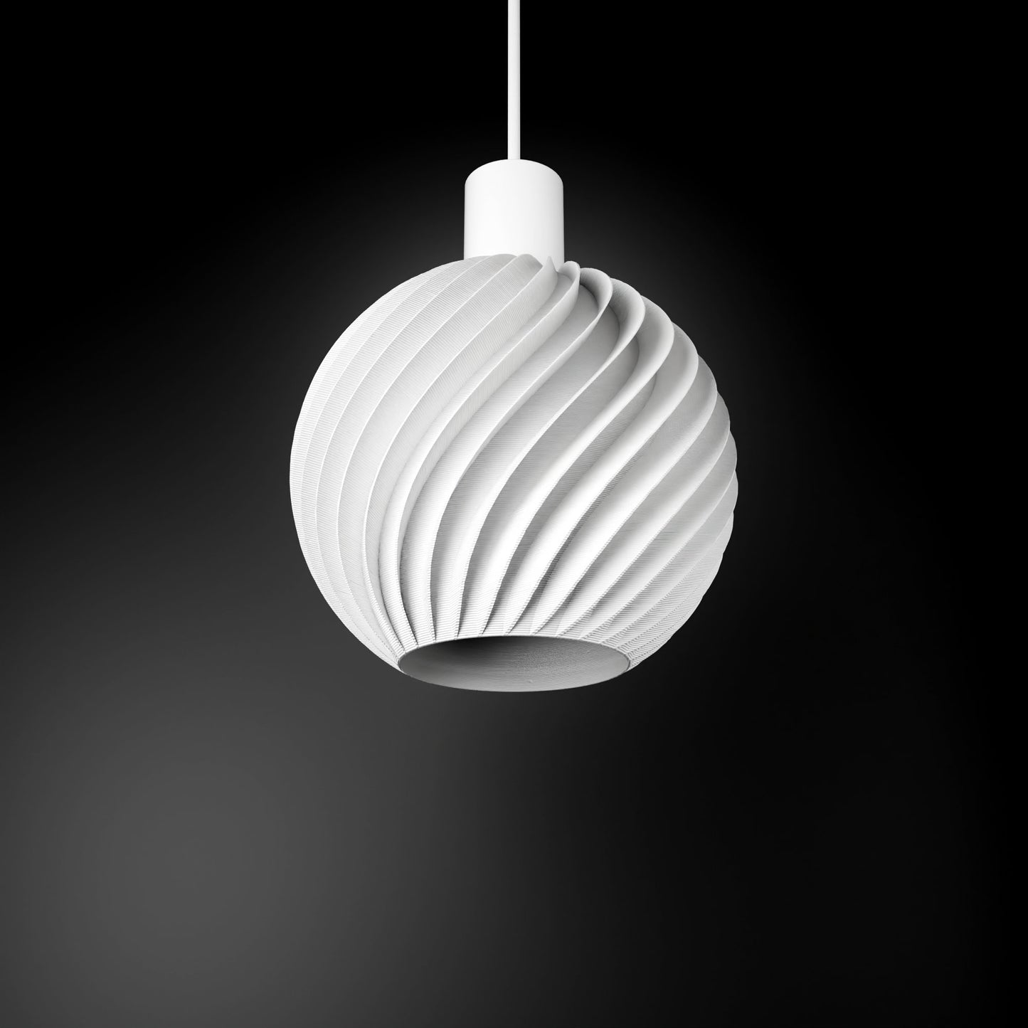 a white light hanging from a black ceiling