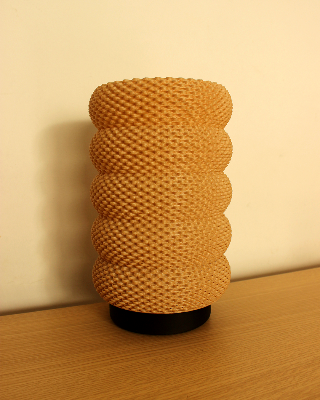 a close up of a vase on a table