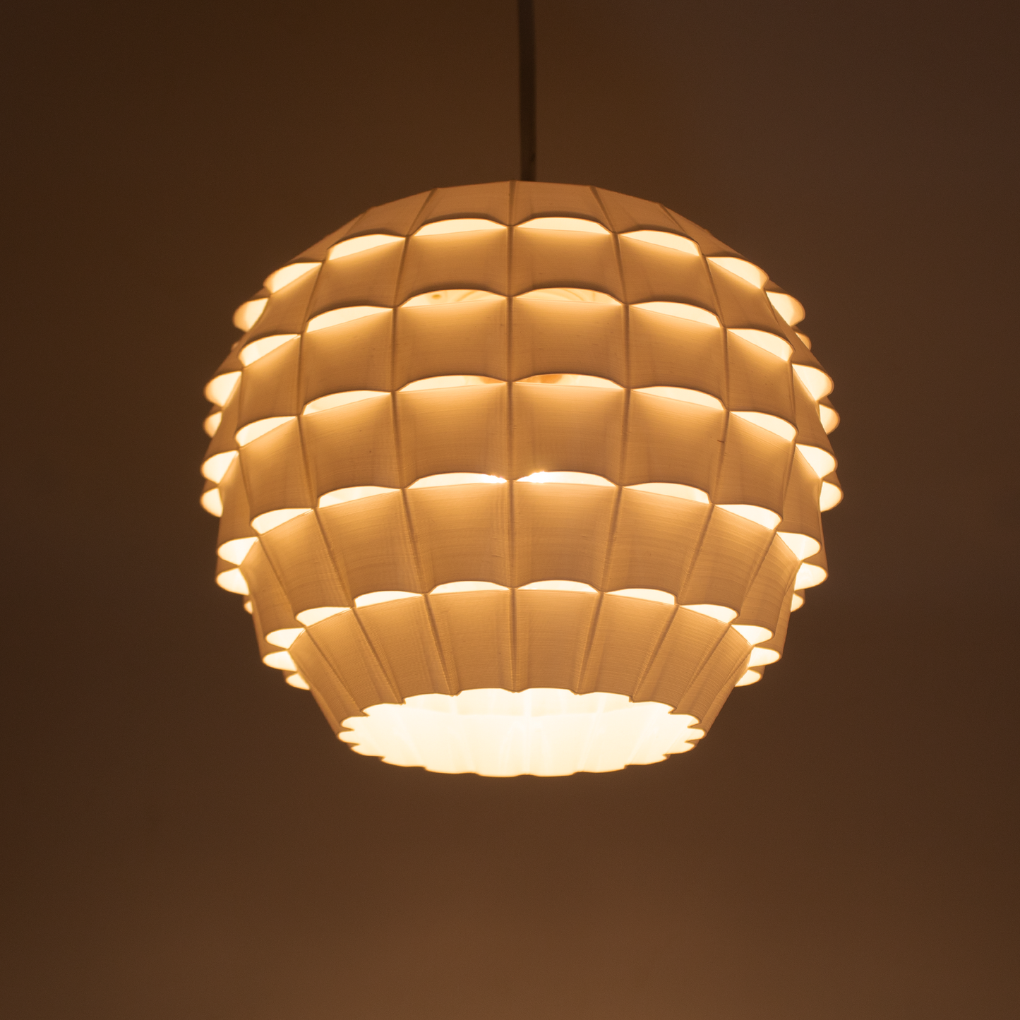 a large light fixture hanging from a ceiling