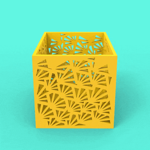 a yellow plastic container with a design on it