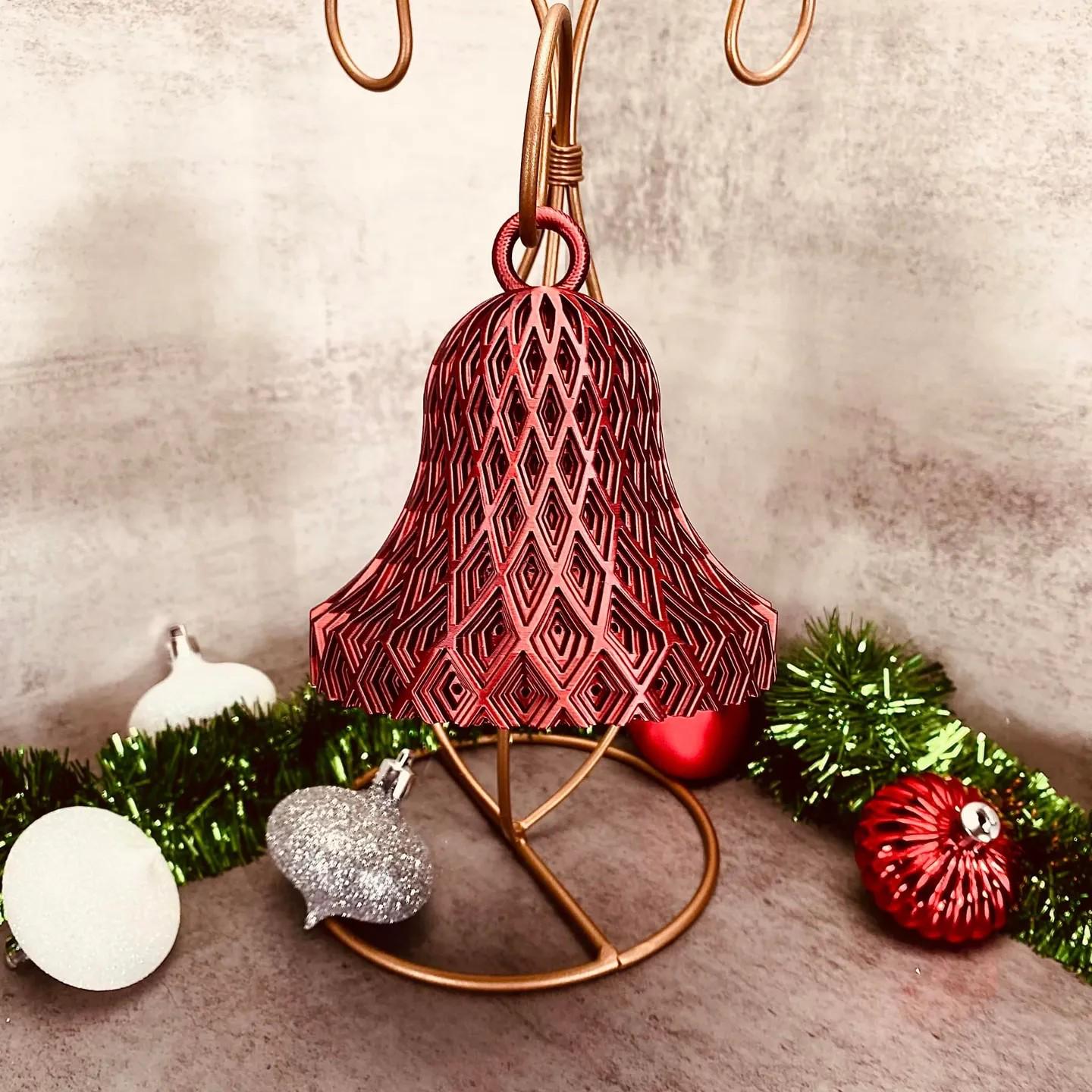 a christmas tree ornament with ornaments around it